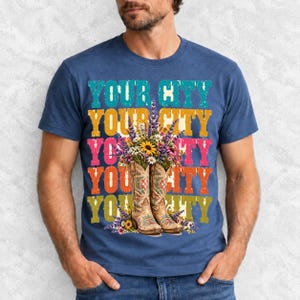 Tan cowboy boots with lavender and wildflowers over a five-line stacked personalized city word in retro colors