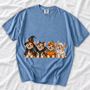 Realistic illustration of four corgi puppies in wizard, bat, pumpkin and mummy costumes in a row
