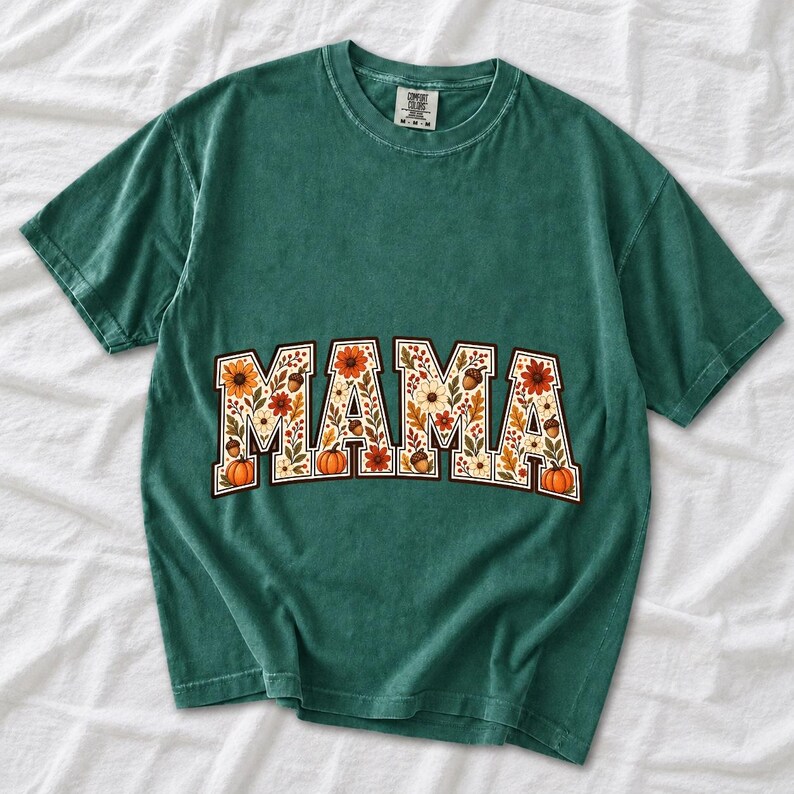 Arched varsity word MAMA filled with fall flowers and acorns in cream, rust and mustard