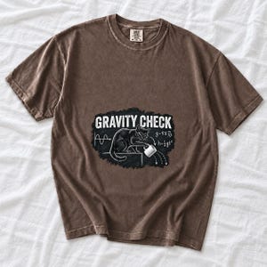 Gravity Check Black Cat Physics Comfort Colors Shirt product mockup, image 3