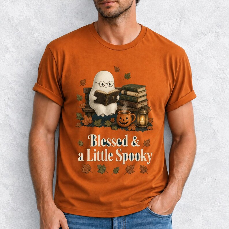 Cute ghost with glasses reading a Bible with a candle and mug, text "Blessed & a Little Spooky", retro fall illustration