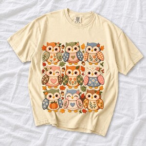 Grid of chubby owls with quilted patchwork wings, acorns and leaves in pumpkin, sage and dusty blue autumn colors