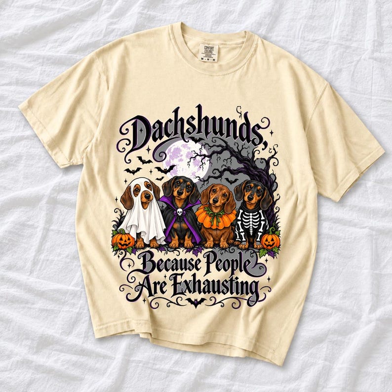 Four dachshunds in Halloween costumes under a spooky tree with text Dachshunds, Because People Are Exhausting