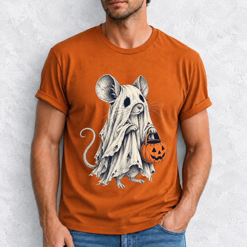 Etched pen illustration of a small mouse in a sheet ghost costume holding a candy bucket, bone white with orange accent