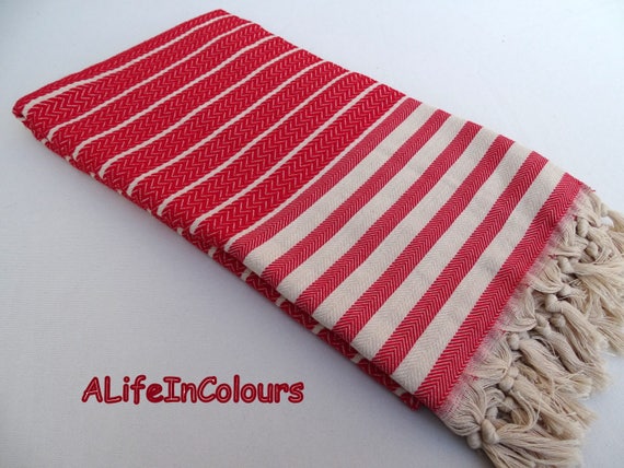 red patterned bath towels