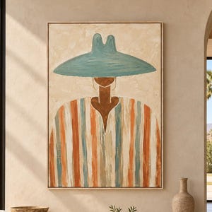 May include: A rectangular wall art piece featuring a stylised figure wearing a wide-brimmed teal hat and a vertically striped tunic in shades of orange, teal, and cream. The painting has a textured, brushstroke finish on a neutral beige background.