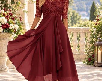 May include: A burgundy midi-length dress featuring a sheer illusion neckline and elbow-length sleeves adorned with intricate floral lace embroidery. The bodice transitions into a flowing, layered chiffon skirt that falls to a mid-calf hemline.