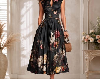 May include: A black sleeveless midi dress featuring a vibrant floral print with red, pink, yellow, and white flowers. The dress has a high mandarin collar, a teardrop-shaped cutout at the chest, a fitted waist, and a full, pleated skirt.