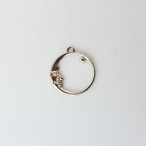 man in the moon and star charm cast in sterling silver 92.5