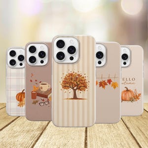 May include: Five smartphone cases featuring autumn-themed designs. The first has a plaid pattern and pumpkin, the second a coffee cup and book, the third a tree on stripes, the fourth hanging leaves, and the fifth a pumpkin with the text Hello autumn.