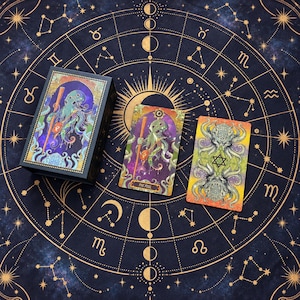 May include: A tarot deck box and two cards featuring an octopus illustration. The box and one card show an octopus holding a staff with the text THE FOOL. The second card displays a symmetrical octopus design with a central six-pointed star.