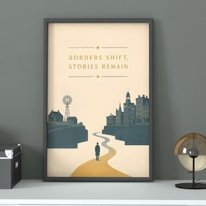 May include: A framed vertical poster featuring a cream-colored background with a dark blue silhouette of a town and a windmill. A winding yellow path leads to a lone figure standing in the center. The text reads: BORDERS SHIFT, STORIES REMAIN.
