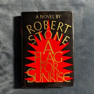 En flagga för soluppgång av Robert Stone 1981 Första upplagan Första trycket Nära fin/VG+