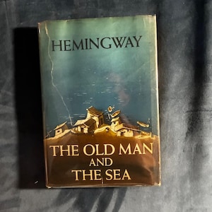 Stary człowiek i morze Ernesta Hemingwaya 1952 Pierwsze wydanie Prawie w dobrym stanie/bardzo dobrym Oprawa twarda zdjęcie 1