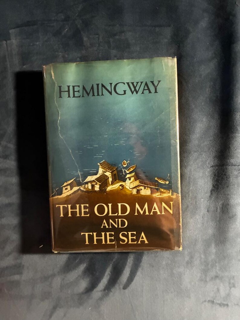Stary człowiek i morze Ernesta Hemingwaya 1952 Pierwsze wydanie Prawie w dobrym stanie/bardzo dobrym Oprawa twarda zdjęcie 1