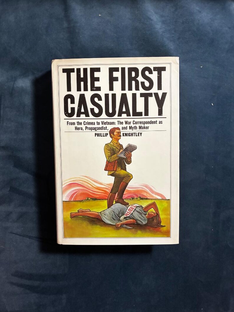 La primera víctima de Phillip Knightley, 1975, primera edición, segunda impresión, casi perfecto/muy bueno. imagen 1