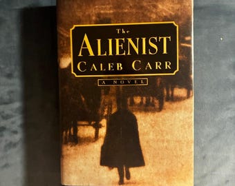 The Alienist by Caleb Carr 1994 First Edition 7th Printing Near Fine/Very Good