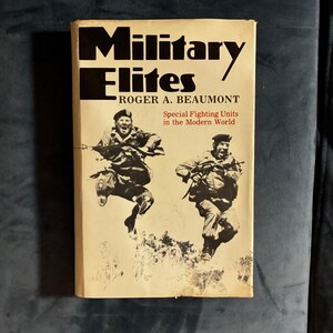 Élites militares por Roger A. Beaumont 1974 Primera edición Primera impresión Casi perfecto/Muy bueno imagen 1