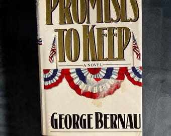 Puede incluir: Un libro de tapa dura titulado Promises to Keep: A Novel de George Bernau. La cubierta blanca presenta letras doradas, dos pequeñas banderas estadounidenses en mástiles y un gráfico de banderines plisados en rojo, blanco y azul en el centro.