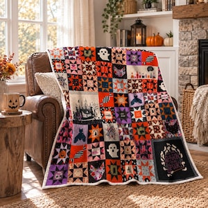 May include: A patchwork quilt featuring a Halloween theme with orange, black, and purple squares. The design includes motifs of ghosts, bats, pumpkins, and a forest scene. One large black panel displays the text 'Tis the season to be spooky'.