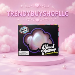 May include: A black rectangular product box labeled Soft Doh Squish! and Cloud Pleaser pure Squish Bliss! with a cloud-shaped cutout revealing an iridescent, pearlescent, cloud-shaped toy inside. The box includes a 3+ age rating and warning text.