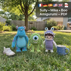 May include: Three crocheted amigurumi dolls representing Sully, Mike, and Boo. The blue monster has purple spots, the green monster has one large eye, and the child wears a purple monster costume. Text reads: Sully • Mike • Boo Amigurumi – PDF.