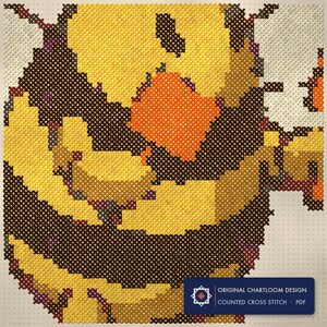 Close up of the bee air traffic control cross stitch design worked stitch by stitch, every cross and thread colour visible