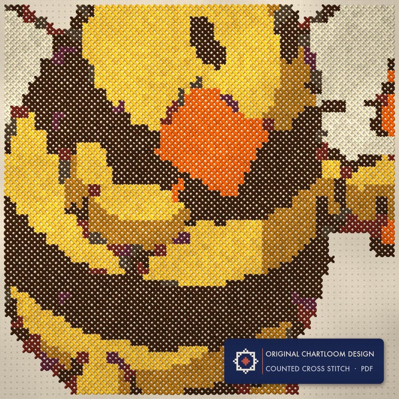 Close up of the bee air traffic control cross stitch design worked stitch by stitch, every cross and thread colour visible