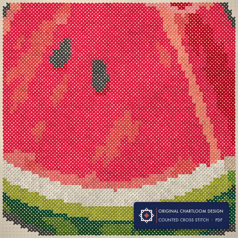 Close up of the a watermelon slice cross stitch design worked stitch by stitch, every cross and thread colour visible