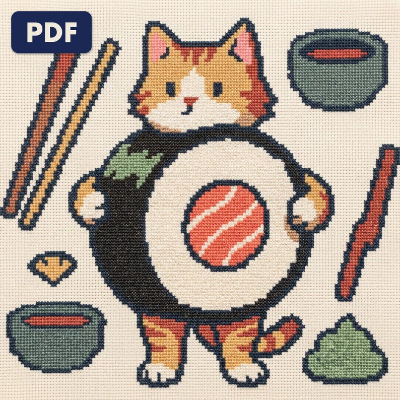 A finished cat cross stitch piece, stitched and framed on a wall