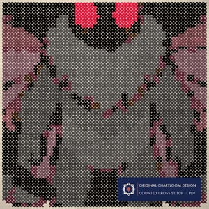 Close up of the mothman cross stitch design worked stitch by stitch, every cross and thread colour visible
