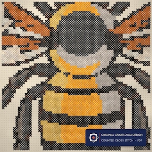 Close up of the a honeybee cross stitch design worked stitch by stitch, every cross and thread colour visible