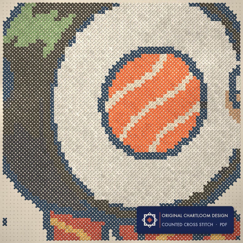 Close up of the cat cross stitch design worked stitch by stitch, every cross and thread colour visible