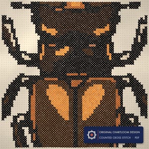 Close up of the stag beetle cross stitch design worked stitch by stitch, every cross and thread colour visible