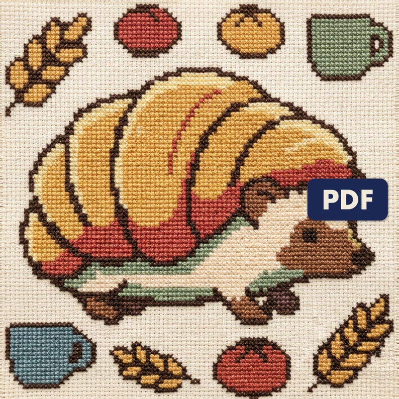 A finished hedgehog cross stitch piece, stitched and framed on a wall