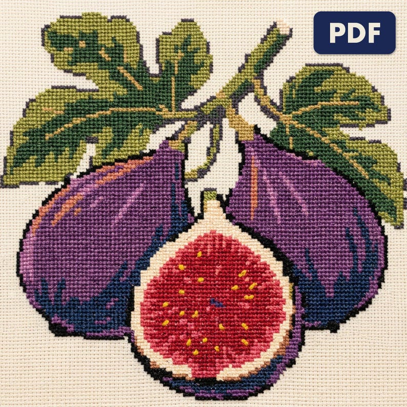 A finished purple figs cross stitch piece, stitched and framed on a wall
