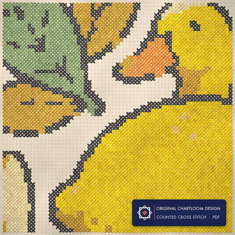 Close up of the duck cross stitch design worked stitch by stitch, every cross and thread colour visible
