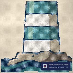 Close up of the a lighthouse cross stitch design worked stitch by stitch, every cross and thread colour visible