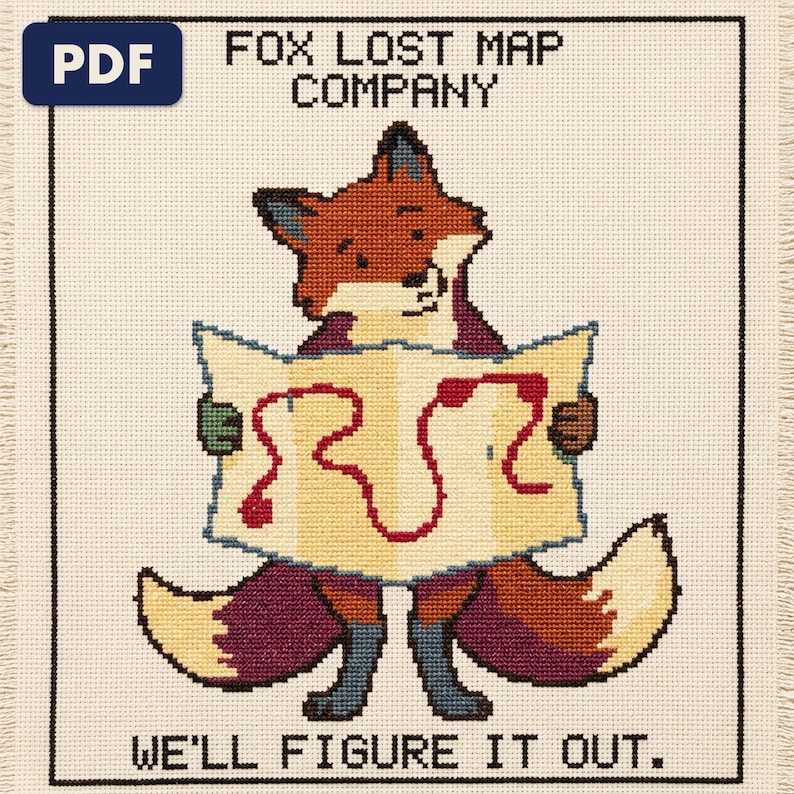 A finished fox lost map company cross stitch piece, stitched and framed on a wall