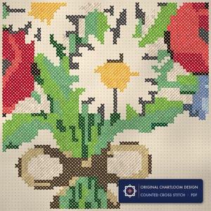 Close up of the a wildflower bouquet cross stitch design worked stitch by stitch, every cross and thread colour visible