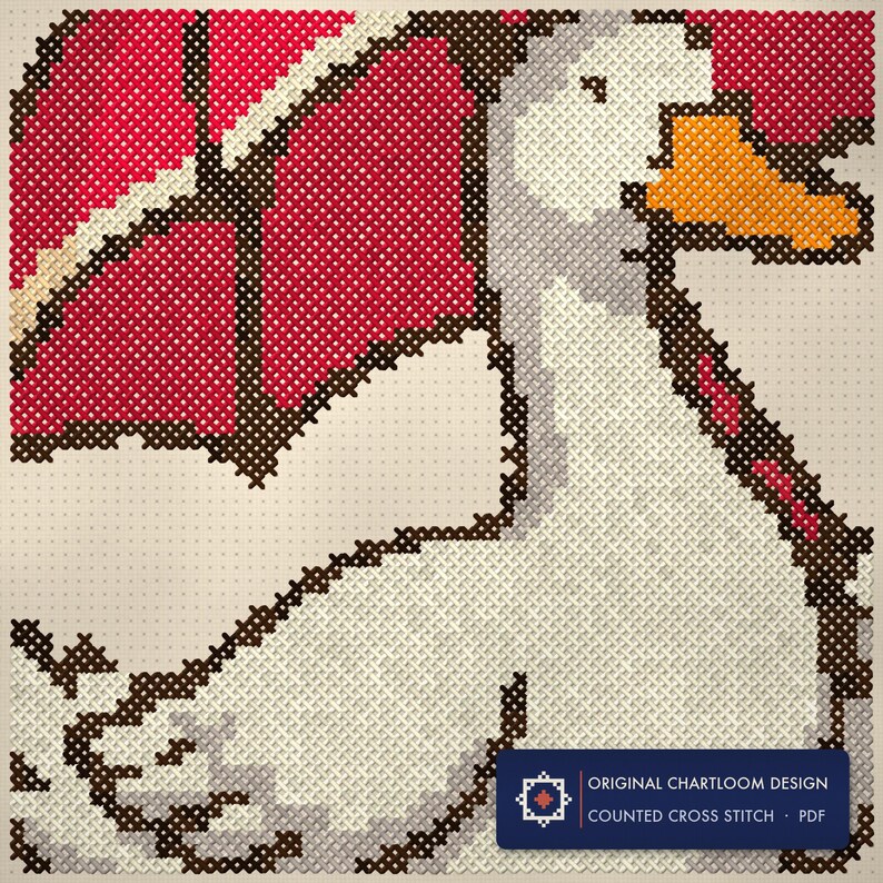 Close up of the duck umbrella company cross stitch design worked stitch by stitch, every cross and thread colour visible
