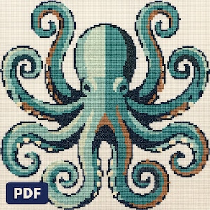A finished an octopus cross stitch piece, stitched and framed on a wall