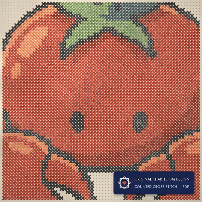 Close up of the crab cross stitch design worked stitch by stitch, every cross and thread colour visible