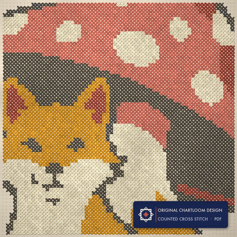 Close up of the fox cross stitch design worked stitch by stitch, every cross and thread colour visible