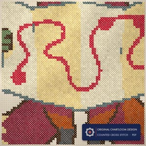 Close up of the fox lost map company cross stitch design worked stitch by stitch, every cross and thread colour visible