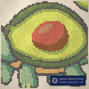 Close up of the turtle cross stitch design worked stitch by stitch, every cross and thread colour visible