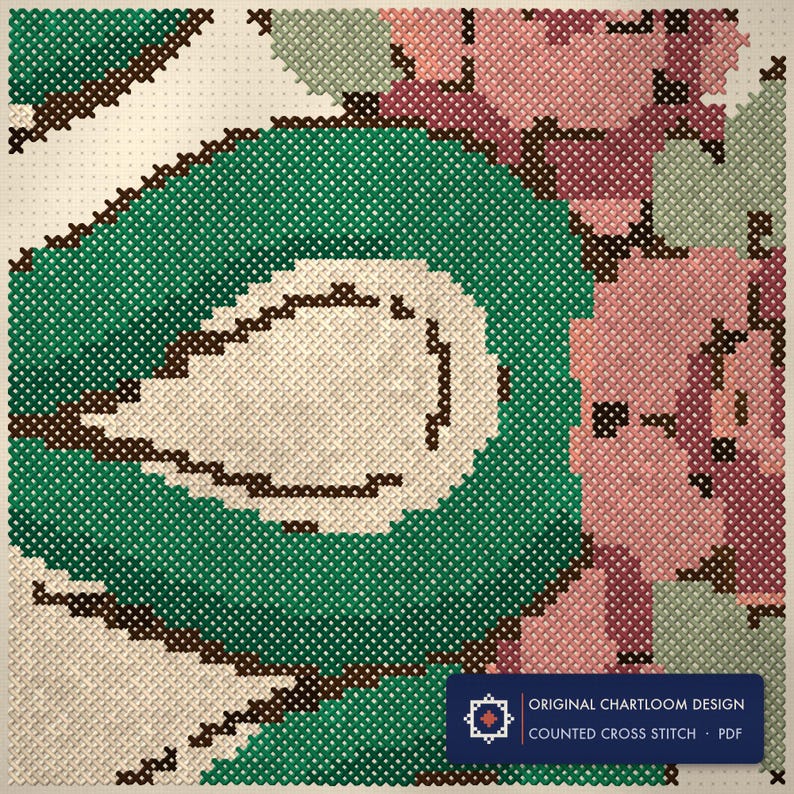 Close up of the serpent with roses cross stitch design worked stitch by stitch, every cross and thread colour visible