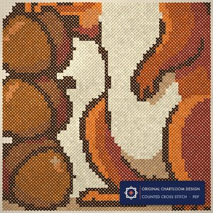 Close up of the squirrel acorn reserve cross stitch design worked stitch by stitch, every cross and thread colour visible