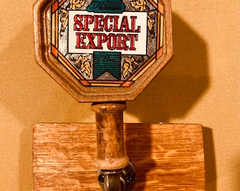 Expositor de manijas para grifos de cerveza. No incluye manijas.