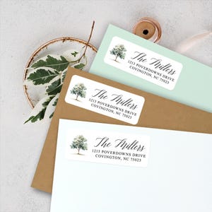 May include: Three white return address labels with a watercolor tree design and the text "The Phillers" followed by the address "1213 POVERDOWNS DRIVE COVINGTON, NC 75023".